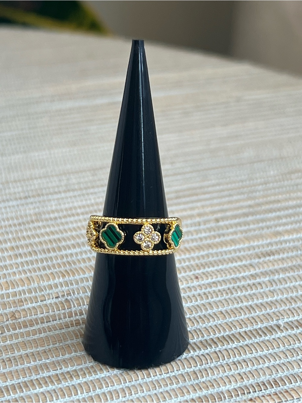 Adjustable green striped, silver and gold clover band ring with crystal accents